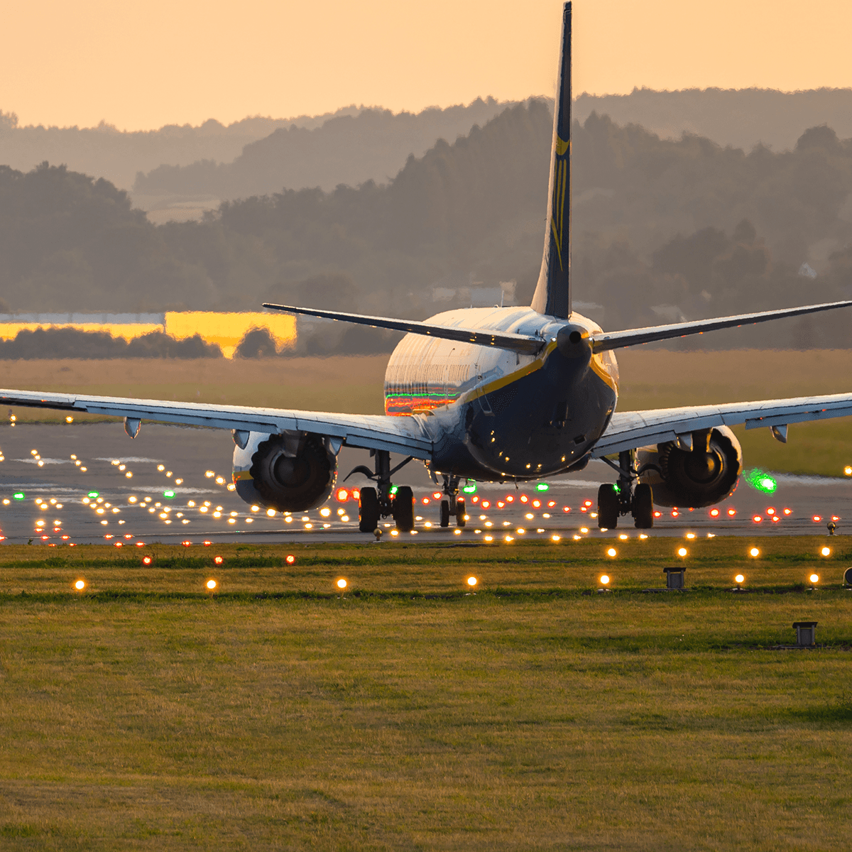 A plane landing on a runway